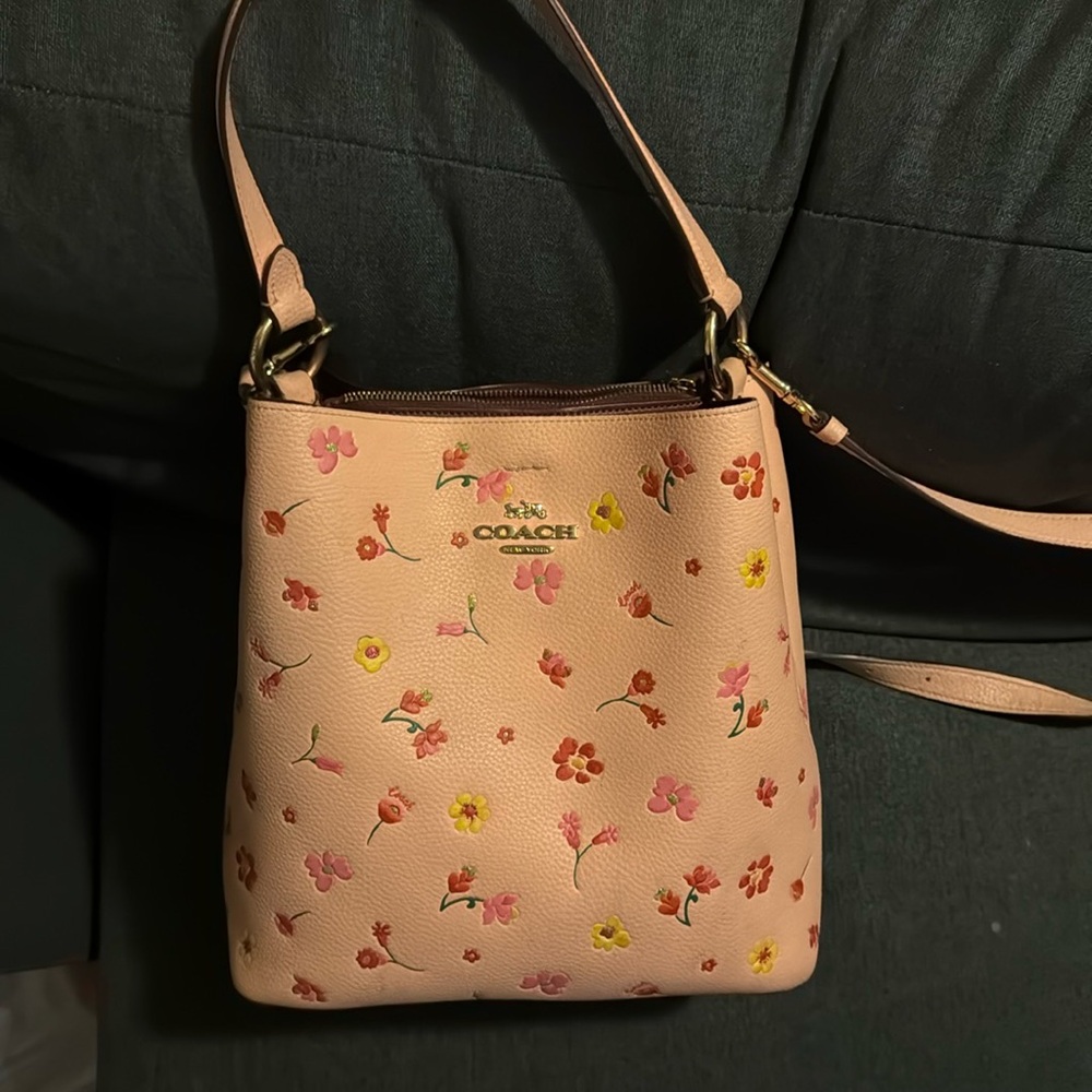 Pink flowered coach crossbody bucket purse